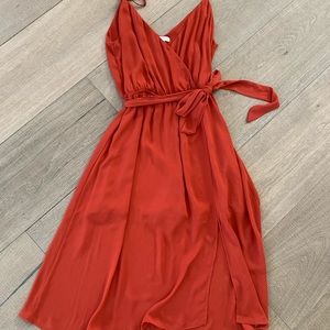 Burnt orange pseudo wrap dress